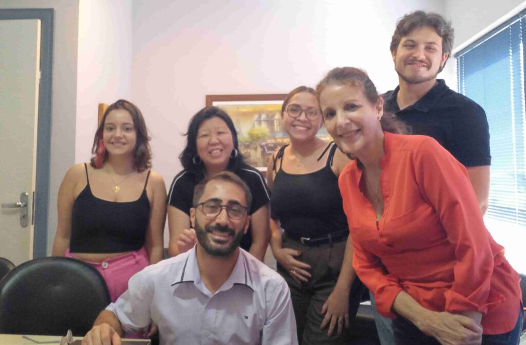 Psicólogos da Equipe Práxis reunidos para planejamento clínico e troca de experiências